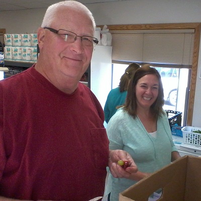 Food Pantry workers smile for the camera.